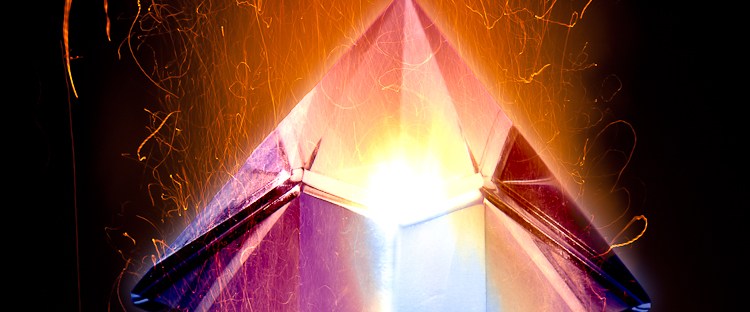 cristal pyramd burning in fire flame, alchemy black work representation