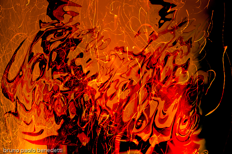 shadows inside a fire flame on black background