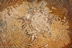 brown color fluid shape with many tones in rough texture