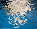 water reflections of white floating abstract shape on blue water