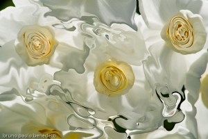 floating abstract white shapes with yellow spots