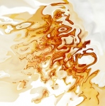 Orange shades on white background in acquerello texture. Orange fluid floating shapes dissolving on white fluid background.