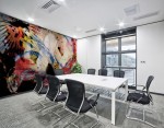 mural decor with abstract pattern in red and white color with shades on meeting room wall